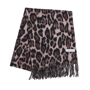 Detailed view of women autumn winter classic leopard print cashmere feel tassel scarf edge texture.