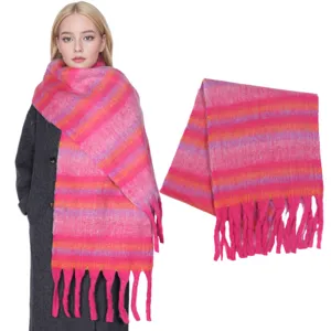 Cozy pink striped winter scarf with fringe, thick and warm fashion accessory for women.