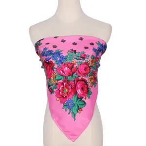 Detailed view of the pink Russian ethnic floral square scarf, cotton hair accessory.