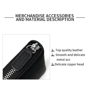 Black leather zipper wallet detail showing premium texture and smooth hardware.