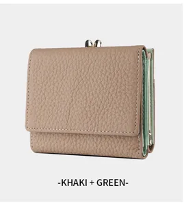 Trifold genuine leather women wallet in khaki and green with kiss lock coin pocket details.