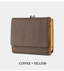 Compact trifold women leather wallet with contrast color design and metal clasp closure.