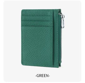 Green leather card holder detail showing multiple card slots and secure side zipper pocket.