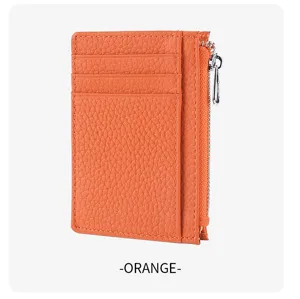 Orange leather card holder detail view featuring multiple slots and zipper pocket for daily use.