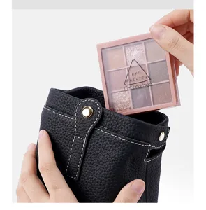 Genuine leather cosmetic storage bag with 9-color eyeshadow palette makeup tool set detail view