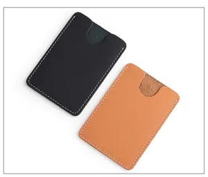 Porte-cartes minimaliste en cuir véritable noir et brun, montrant des détails de couture.