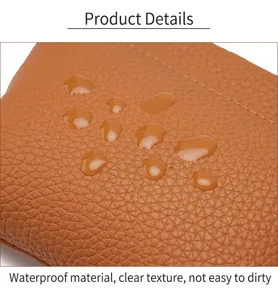 Monedero de cuero microfibra primer plano, cartera patrón lichi impermeable vista detalle.
