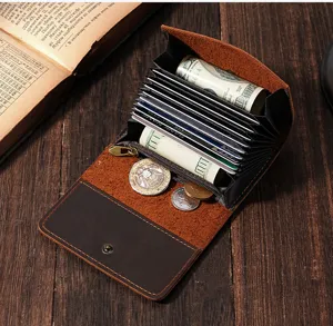 Vintage crazy horse leather card holder detail shot, multi-slot accordion wallet with coin pocket.