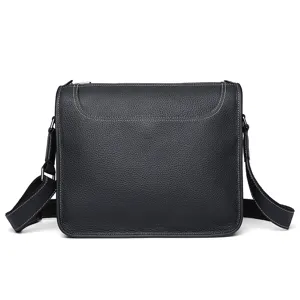 Men's black genuine cowhide leather business casual messenger crossbody shoulder bag for use.