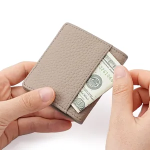 Minimalist genuine leather mini wallet bifold card holder for women, compact and portable.