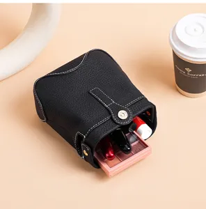 Genuine leather makeup bag top layer cowhide cosmetic organizer pouch detail view with lipstick storage.
