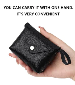 Mini leather coin purse for women, small pocket wallet with snap closure and handy strap.