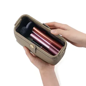 Genuine leather cosmetic bag with kiss lock closure, vintage style toiletry pouch for women.