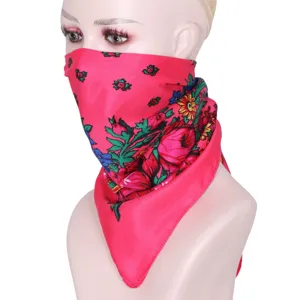 Detailed view of the vibrant pink Russian style floral scarf showcasing folk design.
