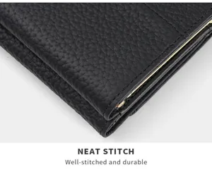 Close-up of black genuine leather wallet showing detailed neat stitching and fine texture.