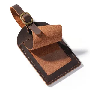 Vintage crazy horse leather luggage tag with privacy flap, metal buckle, travel bag id label.
