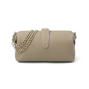 Taupe leather cosmetic bag with gold chain strap, stylish doctor bag handbag for women.