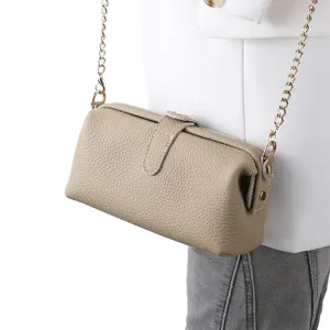 Elegant taupe leather crossbody cosmetic bag with gold chain for women daily use.
