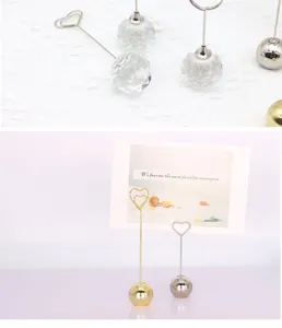 Crystal and metal sphere memo card holders detail shot, perfect for wedding table decor.
