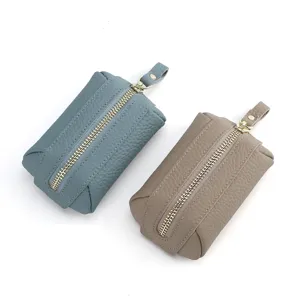 Genuine leather coin purse for women, portable zipper small change wallet in blue and brown.