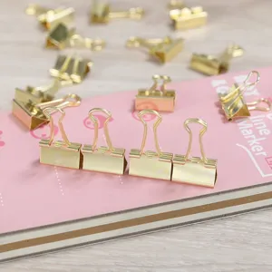 Gold binder clips medium size metal paper clamps for office stationery and document.