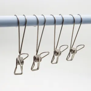 Stainless steel hook clips detail view, spring hanging clips for kitchen bathroom storage.