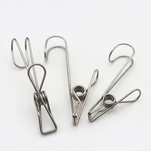 Stainless steel hook clip detail view, wire clamp for hanging clothes and kitchen organization.