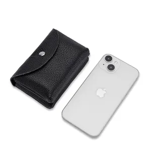Mini genuine leather coin purse for women, soft litchi grain small snap wallet for coins.