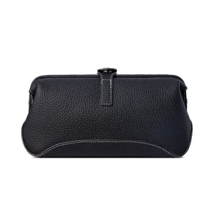 Large genuine leather toiletry bag, black cosmetic pouch with contrast stitching for travel.