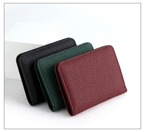Mini cartera de cuero genuino para mujer con multiples ranuras para tarjetas y broche.