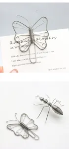 Creative silver butterfly paper clip metal insect shape stationery for journal and office use.
