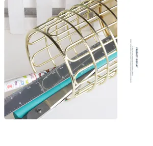 Nordic metal pen holder makeup brush storage basket for office desktop organization.