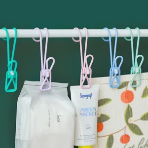 Multi-purpose utility clips hanging hooks for home bathroom storage and clothes drying display.