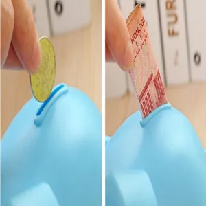 Cute blue plastic piggy bank for kids, fun coin and cash saving jar with slot for daily use.