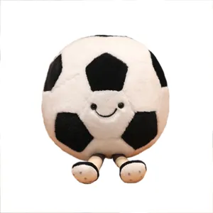 Adorable peluche ballon de football avec visage souriant et jambes ballantes douce poupée.