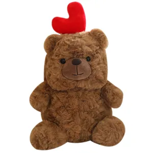 Cute brown teddy bear plush toy with red heart, perfect Valentine's gift for girls and kids.