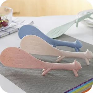 Cute squirrel rice spoon detail shot, wheat straw material, non-stick standing kitchen tool.