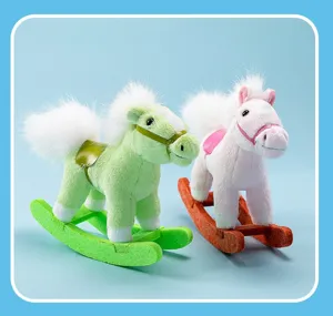 Close-up of cute small plush rocking horse toy with soft fabric and colorful base.