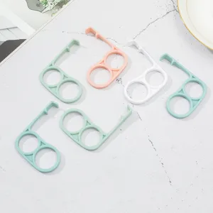 Multi-functional plastic finger ring phone stand and portable anti-touch grip holder tool.