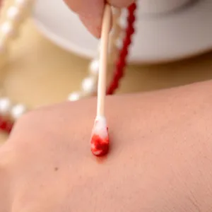 Double-headed wooden cotton swabs for daily makeup removal and personal cleaning use.