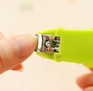 Cute animal design nail clipper with green plastic case and sharp stainless steel blade.