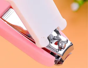 Close-up detail view of the cute cartoon animal nail clipper showing smooth metal and plastic.