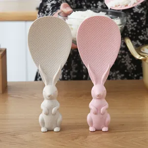 Cute standing rabbit rice spoon, non-stick vertical spatula for household rice cooker use.