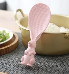 Cute standing rabbit rice paddle, non-stick plastic rice spoon for kitchen cooking.