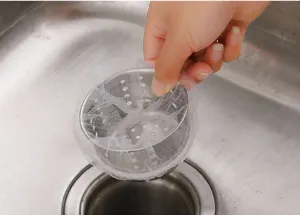 Kitchen sink filter mesh bag for anti-clogging debris disposal, practical design detail.