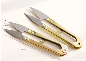 Detail view of U-shaped small stainless steel thread clipping scissors with size markers.