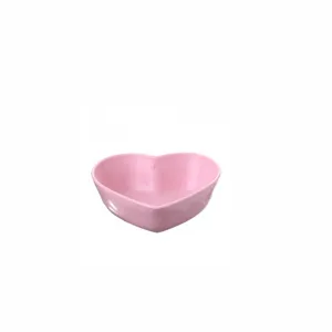 Pink heart-shaped wheat straw small seasoning dish for kitchen soy sauce and vinegar.