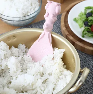 Detailed view of the cute rabbit rice spoon, standing design for nonstick rice serving in kitchen.