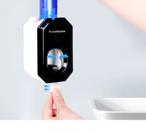 Automatic toothpaste dispenser wall mounted bathroom toothbrush holder squeezer prop