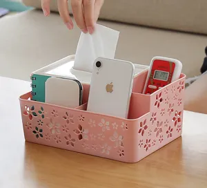 Caja de pañuelos de escritorio de plástico rosa y organizador de mandos con diseño floral.